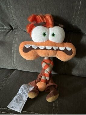 Disney Orange and Brown Plush Character Dog Toy with Green Eyes and Braided Rope